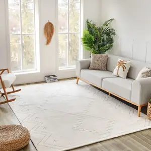 Photo of Cream and Beige Abstract Distressed Area Rug