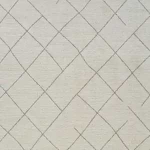 Photo of Cream and Beige Abstract Distressed Area Rug