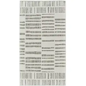 Photo of Cream and Beige Abstract Distressed Indoor Outdoor Area Rug