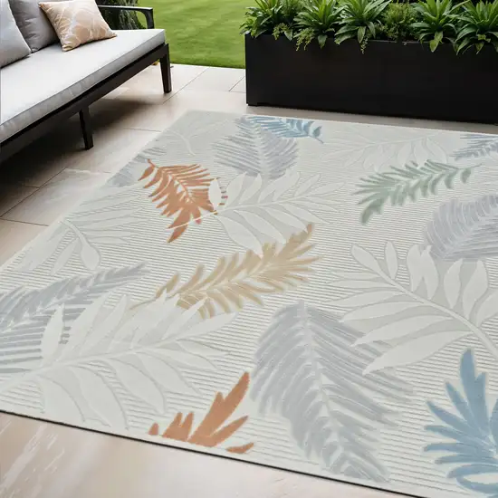 Cream and Beige Botanical Leaves Distressed Indoor Outdoor Area Rug Photo 1