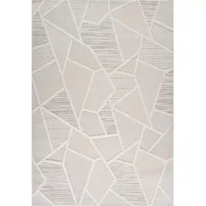 Photo of Cream and Beige Geometric Distressed Area Rug