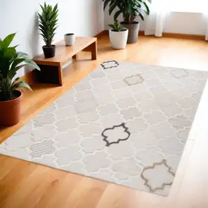 Photo of Cream and Beige Geometric Distressed Area Rug