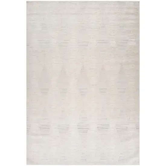 Cream and Beige Geometric Distressed Area Rug Photo 1