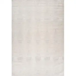 Photo of Cream and Beige Geometric Distressed Area Rug