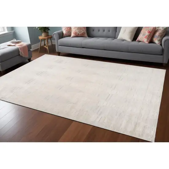 Cream and Beige Geometric Distressed Area Rug Photo 2