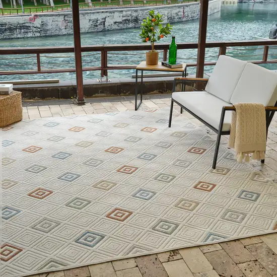 Cream and Beige Geometric Distressed Indoor Outdoor Area Rug Photo 9