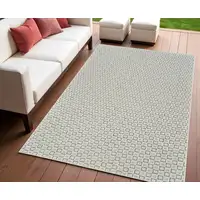 Photo of Cream and Beige Geometric Distressed Indoor Outdoor Area Rug