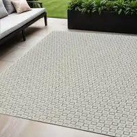 Photo of Cream and Beige Geometric Distressed Indoor Outdoor Area Rug