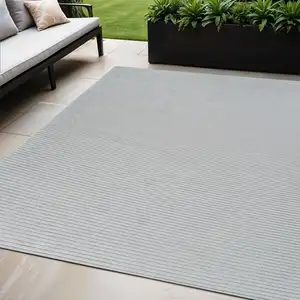 Photo of Cream and Beige Striped Distressed Indoor Outdoor Area Rug