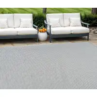 Photo of Cream and Beige Striped Distressed Indoor Outdoor Area Rug