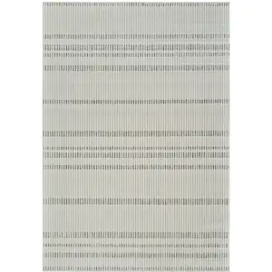 Photo of Cream and Beige Striped Distressed Indoor Outdoor Area Rug