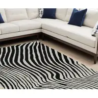 Photo of Cream and Black Abstract Distressed Area Rug