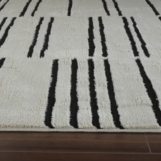 Cream and Black Abstract Distressed Area Rug Photo 3