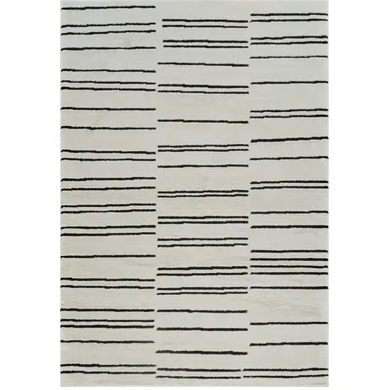 Cream and Black Abstract Distressed Area Rug Photo 5