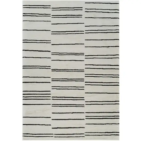 Cream and Black Abstract Distressed Area Rug Photo 1