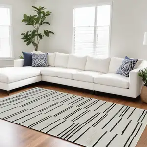 Photo of Cream and Black Abstract Distressed Area Rug