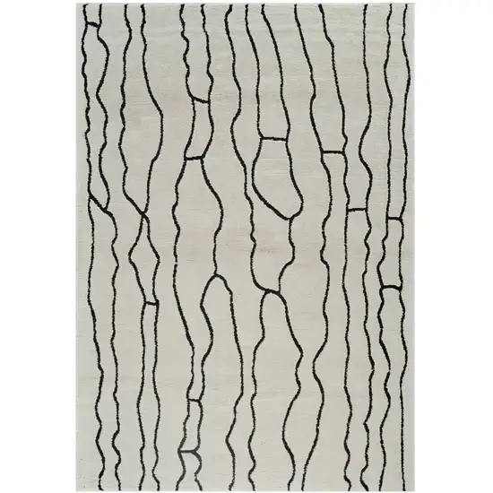 Cream and Black Abstract Distressed Area Rug Photo 4