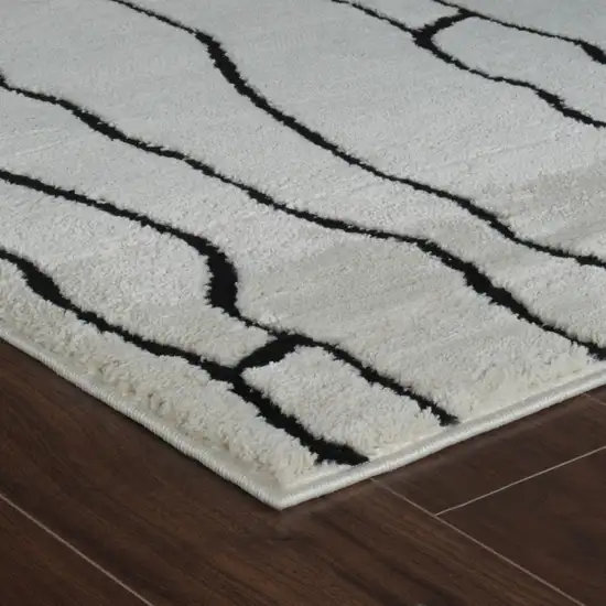 Cream and Black Abstract Distressed Area Rug Photo 3