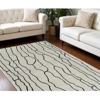 Photo of Cream and Black Abstract Distressed Area Rug