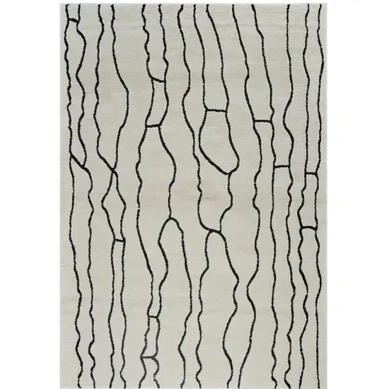 Cream and Black Abstract Distressed Area Rug Photo 4