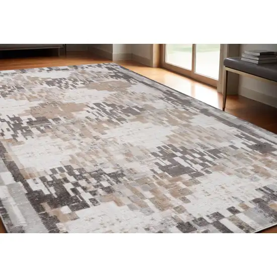 Cream and Brown Abstract Distressed Area Rug Photo 1