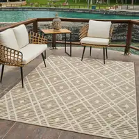 Photo of Cream and Brown Geometric Distressed Indoor Outdoor Area Rug