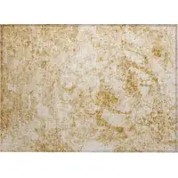 Photo of Cream and Gold Abstract Washable Non Skid Indoor Outdoor Area Rug