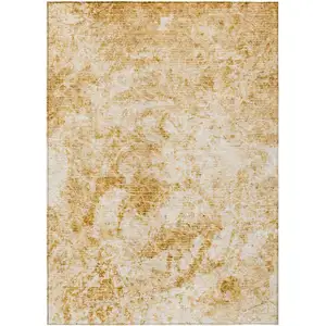 Photo of Cream and Gold Abstract Washable Non Skid Indoor Outdoor Area Rug