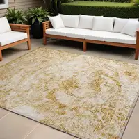 Photo of Cream and Gold Abstract Washable Non Skid Indoor Outdoor Area Rug