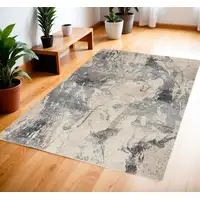 Photo of Cream and Gray Abstract Distressed Area Rug