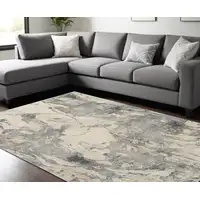 Photo of Cream and Gray Abstract Distressed Area Rug