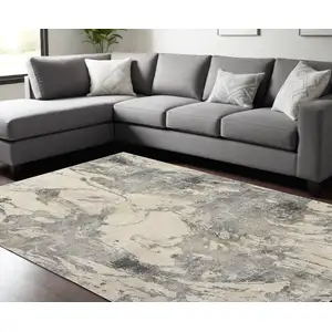 Photo of Cream and Gray Abstract Distressed Area Rug