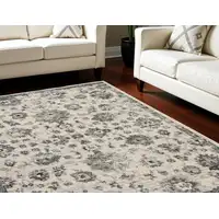 Photo of Cream and Gray Floral Distressed Area Rug