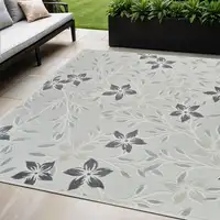 Photo of Cream and Gray Floral Distressed Indoor Outdoor Area Rug