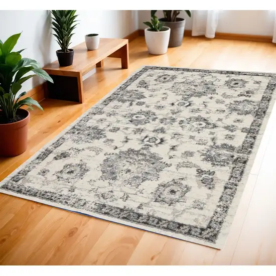 Cream and Gray Floral Medallion Distressed Area Rug Photo 1