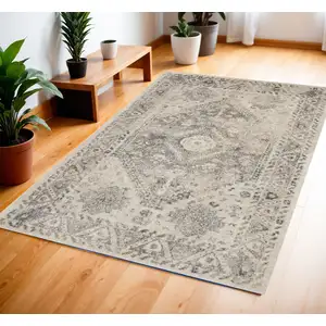 Photo of Cream and Gray Medallion Distressed Area Rug