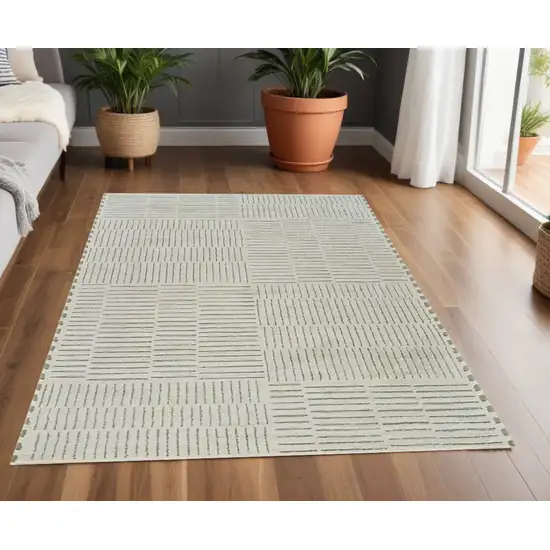 Cream and Green Abstract Distressed Area Rug Photo 1