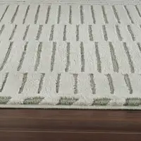 Photo of Cream and Green Abstract Worn Faded Area Rug