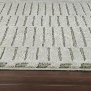 Photo of Cream and Green Abstract Worn Faded Area Rug