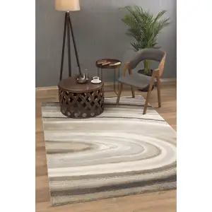 Photo of Cream and Tan Abstract Marble Area Rug