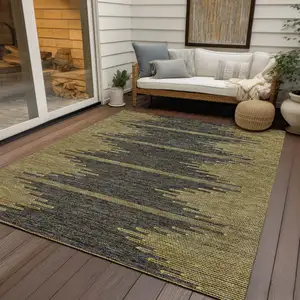 Photo of Dark Gray And Gold Abstract Washable Indoor Outdoor Area Rug