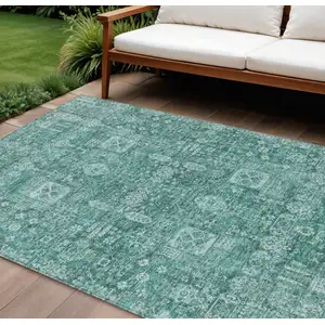 Photo of Dark Green And Aqua Oriental Washable Indoor Outdoor Area Rug