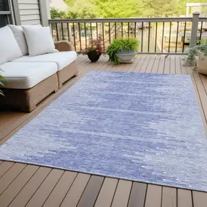 Photo of Denim Blue And Ivory Abstract Washable Indoor Outdoor Area Rug