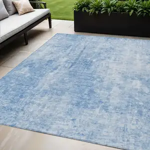 Photo of Denim Blue And Ivory Abstract Washable Indoor Outdoor Area Rug