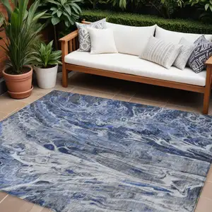 Photo of Denim Blue And Navy Blue Abstract Washable Indoor Outdoor Area Rug