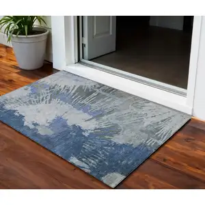 Photo of Denim Blue And Navy Blue Abstract Washable Indoor Outdoor Area Rug