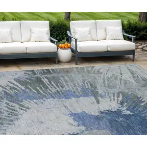 Photo of Denim Blue And Navy Blue Abstract Washable Indoor Outdoor Area Rug