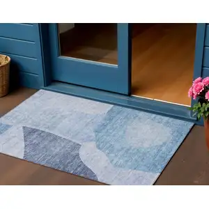 Photo of Denim Blue And Navy Blue Abstract Washable Indoor Outdoor Area Rug