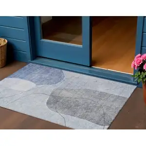 Photo of Denim Blue And Sky Blue Abstract Washable Indoor Outdoor Area Rug