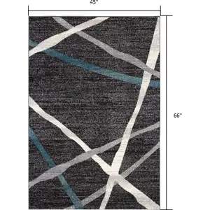 Photo of Distressed Black and Gray Abstract Area Rug